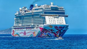 Colorful Norwegian Cruise Line ship on the open water