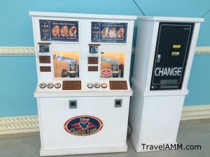 Disney Cruise Line Penny Press Machines with pressed penny options and change machine next to it