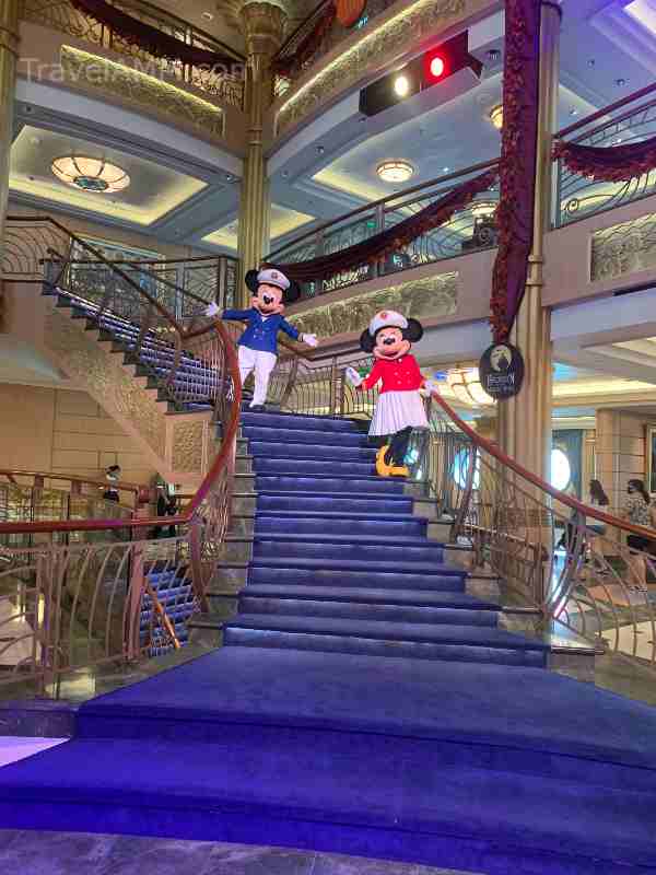 Mickey & Minnie in the atrium upon embarkation