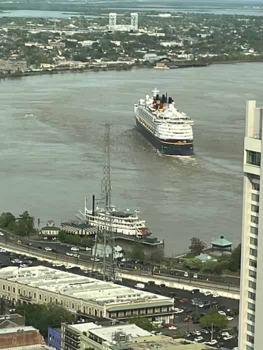 Disney Magic following river bend of the Mississippi River on its way out to International Waters