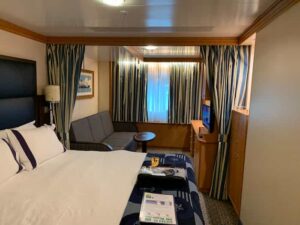 Deluxe Oceanview Stateroom on the Disney Wonder with curtains closed